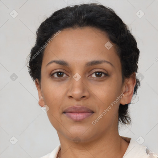 Joyful latino young-adult female with short  brown hair and brown eyes