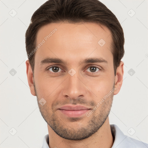 Joyful white young-adult male with short  brown hair and brown eyes