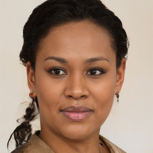 Joyful latino young-adult female with short  brown hair and brown eyes