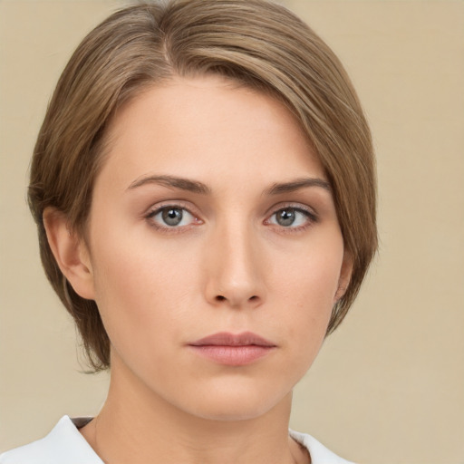 Neutral white young-adult female with medium  brown hair and brown eyes