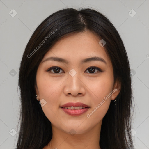 Joyful asian young-adult female with long  brown hair and brown eyes