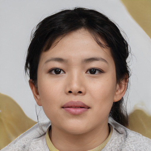 Neutral asian child female with medium  brown hair and brown eyes