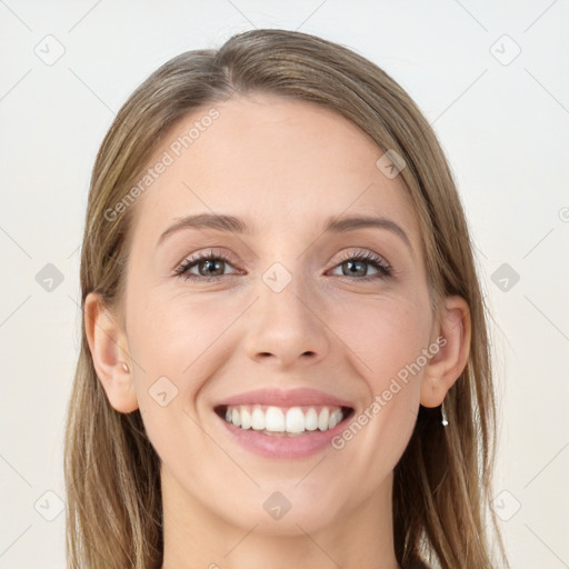 Joyful white young-adult female with long  brown hair and grey eyes