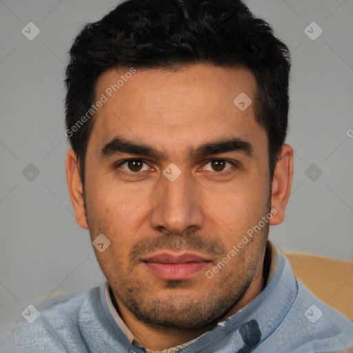 Joyful white young-adult male with short  black hair and brown eyes