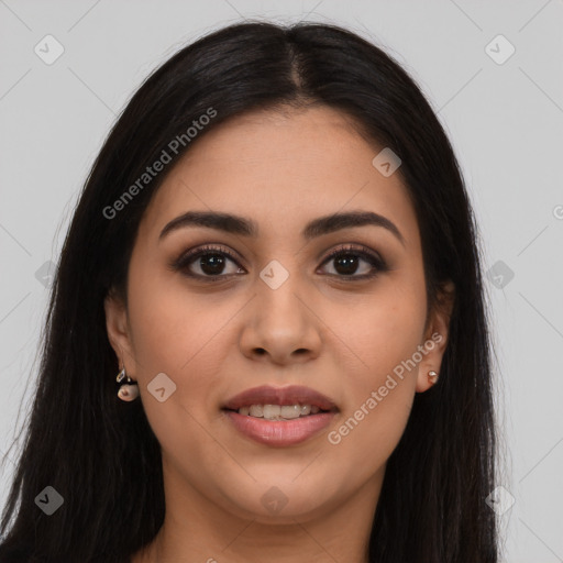 Joyful latino young-adult female with long  brown hair and brown eyes