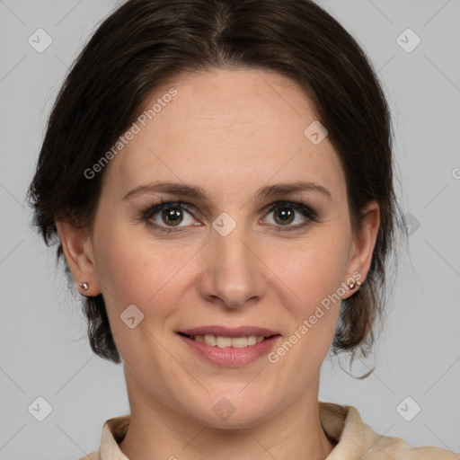 Joyful white adult female with medium  brown hair and grey eyes