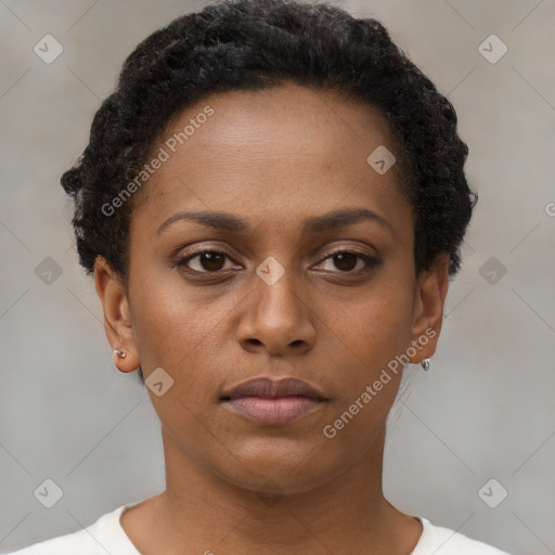 Neutral black young-adult female with short  brown hair and brown eyes