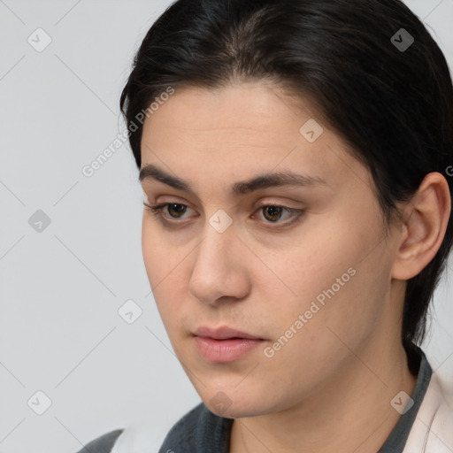 Neutral white young-adult female with medium  brown hair and brown eyes