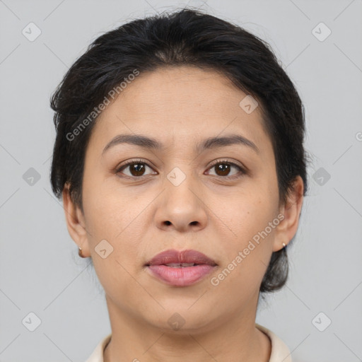 Joyful asian young-adult female with short  brown hair and brown eyes