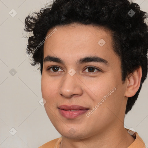 Joyful latino young-adult male with short  brown hair and brown eyes