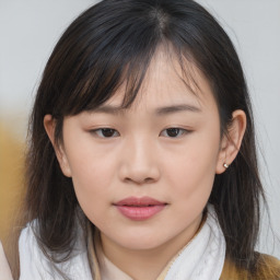 Neutral asian young-adult female with medium  brown hair and brown eyes