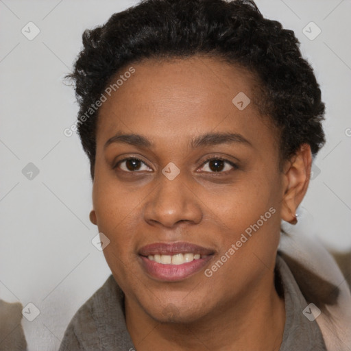 Joyful black young-adult female with short  brown hair and brown eyes