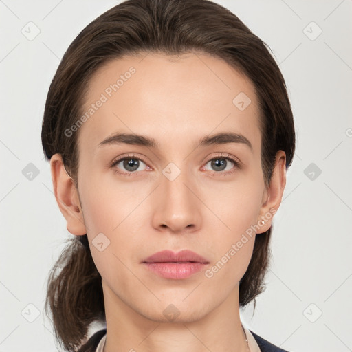 Neutral white young-adult female with medium  brown hair and brown eyes