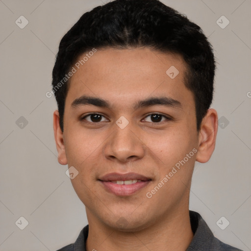 Joyful white young-adult male with short  black hair and brown eyes