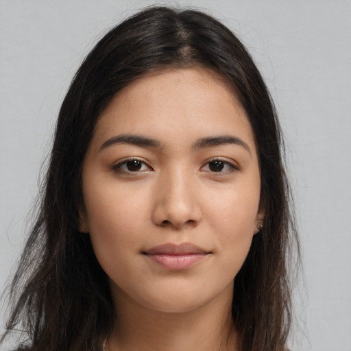 Neutral latino young-adult female with long  brown hair and brown eyes