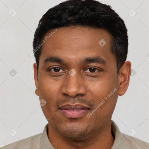 Joyful latino adult male with short  black hair and brown eyes