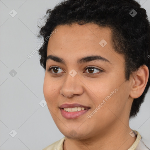 Joyful latino young-adult female with short  black hair and brown eyes