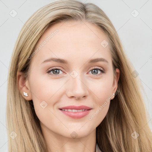 Joyful white young-adult female with long  brown hair and blue eyes