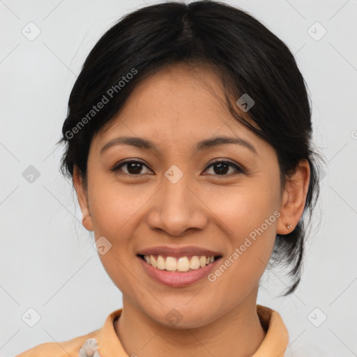 Joyful asian young-adult female with medium  brown hair and brown eyes