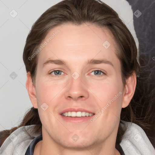 Joyful white young-adult female with medium  brown hair and grey eyes