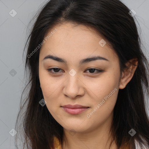 Joyful asian young-adult female with long  brown hair and brown eyes