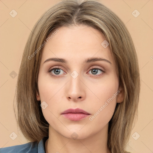 Neutral white young-adult female with long  brown hair and brown eyes