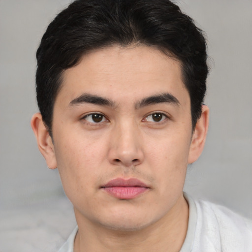 Neutral white young-adult male with short  black hair and brown eyes