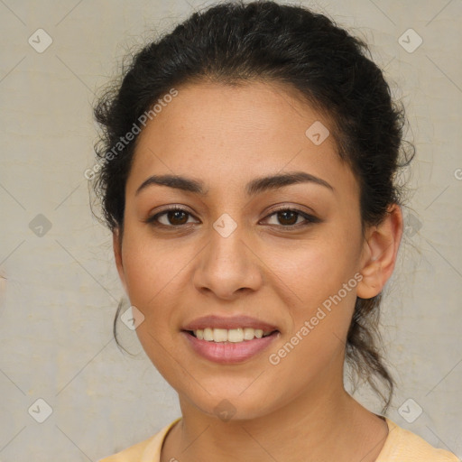Joyful latino young-adult female with medium  brown hair and brown eyes