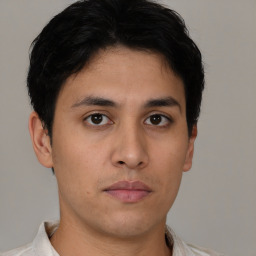 Neutral asian young-adult male with short  brown hair and brown eyes