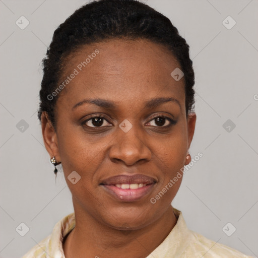Joyful black young-adult female with short  brown hair and brown eyes