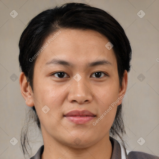 Joyful asian young-adult female with medium  brown hair and brown eyes