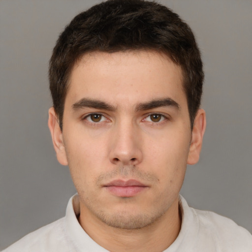 Neutral white young-adult male with short  brown hair and brown eyes