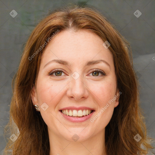 Joyful white young-adult female with long  brown hair and green eyes