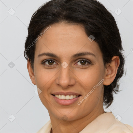 Joyful latino adult female with short  brown hair and brown eyes