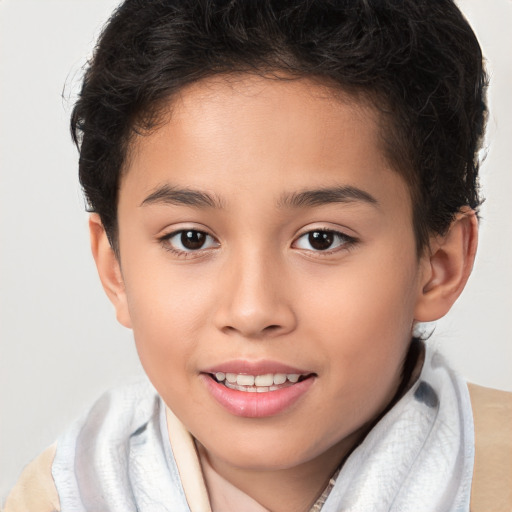 Joyful white child female with short  brown hair and brown eyes