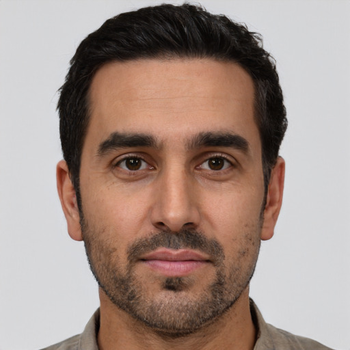 Neutral white young-adult male with short  black hair and brown eyes