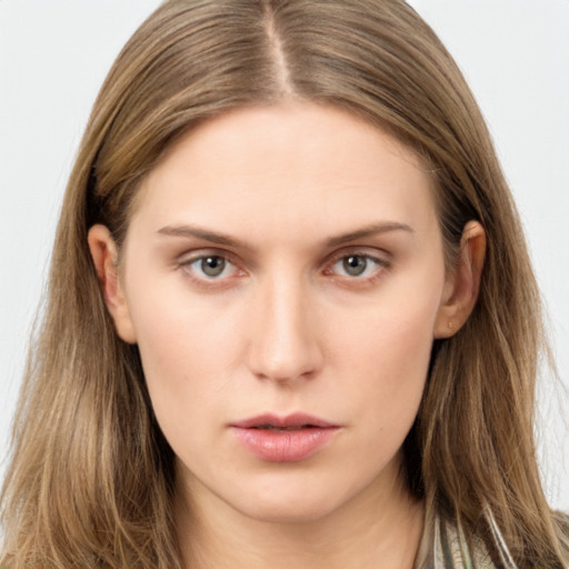 Neutral white young-adult female with long  brown hair and brown eyes