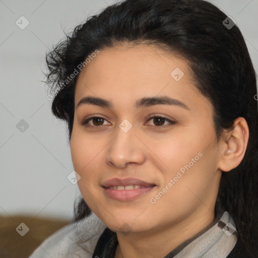 Joyful latino young-adult female with short  black hair and brown eyes