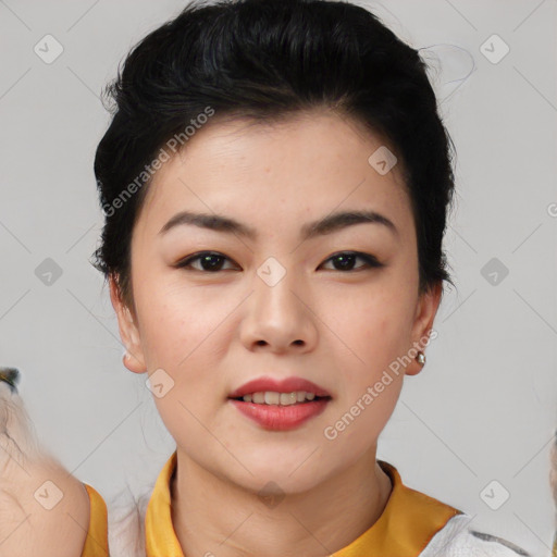 Joyful asian young-adult female with short  black hair and brown eyes