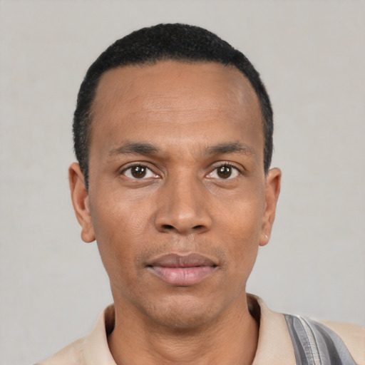 Neutral black young-adult male with short  black hair and brown eyes