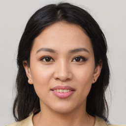 Joyful asian young-adult female with medium  brown hair and brown eyes