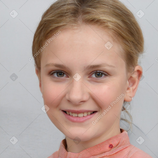 Joyful white child female with medium  brown hair and blue eyes