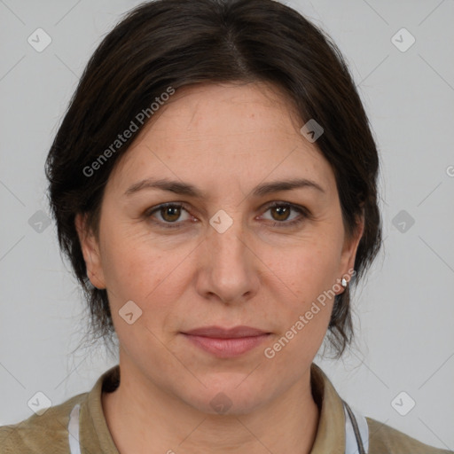 Joyful white adult female with medium  brown hair and brown eyes