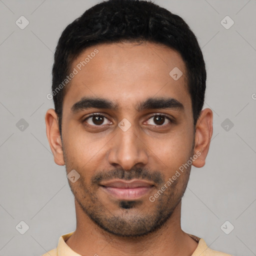 Joyful latino young-adult male with short  black hair and brown eyes