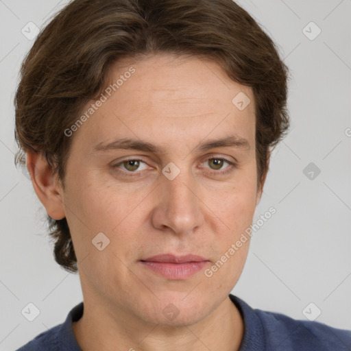 Joyful white adult male with short  brown hair and grey eyes