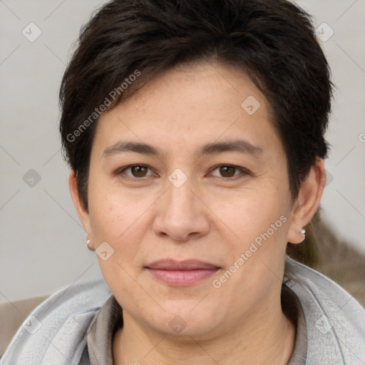 Joyful white adult female with short  brown hair and brown eyes