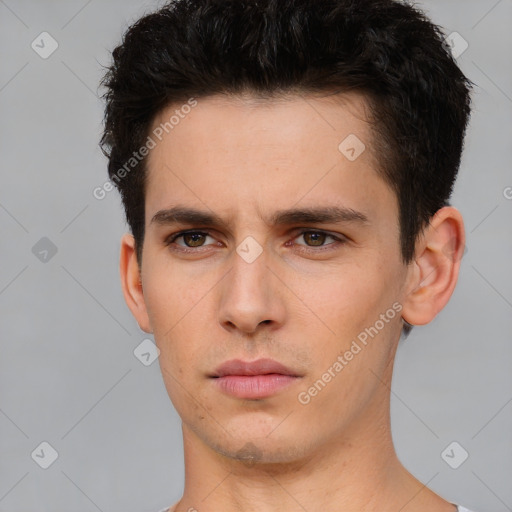 Neutral white young-adult male with short  brown hair and brown eyes