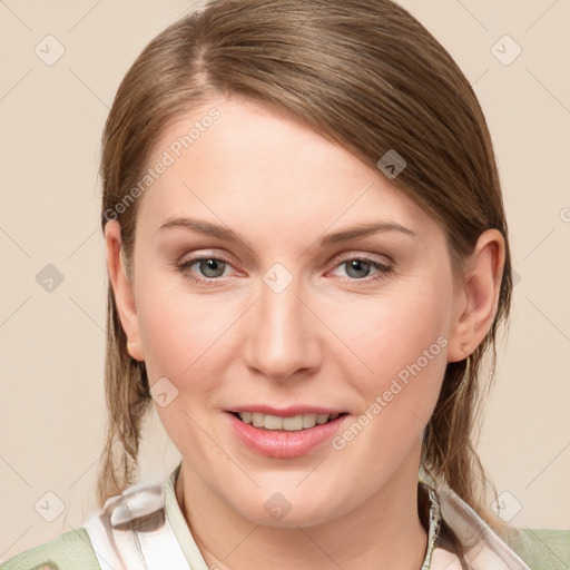 Joyful white young-adult female with medium  brown hair and blue eyes