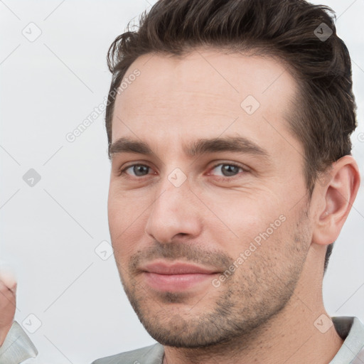 Neutral white young-adult male with short  brown hair and brown eyes