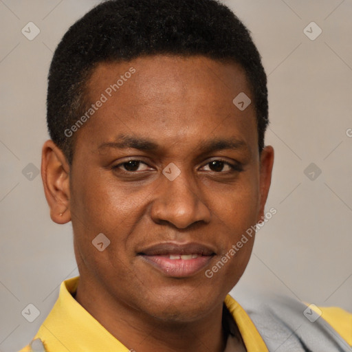 Joyful latino young-adult male with short  brown hair and brown eyes
